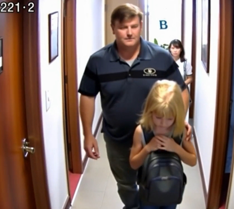 A motel maid notices a young girl entering the same room with her stepfather every